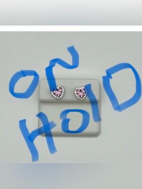 Elegant Pink Heart Stud Earrings MSRP $399
Sterling Silver Pink Moissanite Stone